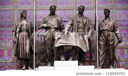 Kiev, Ukraine January 24, 2020: Composition of statues "Workers - Worker, Worker, Worker, Master, Engineer" from the Soviet Union on the territory of the complex for achieving the national economy in  118094703