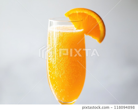 Mimosa cocktail with orange slice is sparkling on white background 118094898