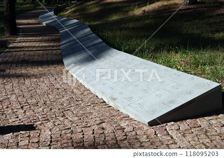 Kiev, Ukraine September 12, 2020: Memorial in the Bykivnyansky forest near Kiev, where thousands of Polish officers were shot by the NKVD in 1940 Kiev, Ukraine September 12, 2020: Memorial in the Bykivnyansky forest near Kiev, where thousands of Polish officers were shot by the NKVD in 1940 118095203