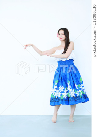 A woman dancing hula A woman dancing hula 118096130
