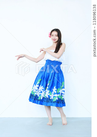 A woman dancing hula A woman dancing hula 118096138