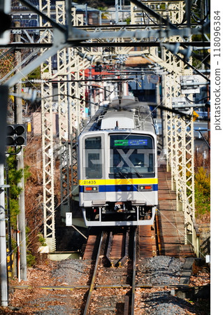 Train crossing an iron bridge 118096384