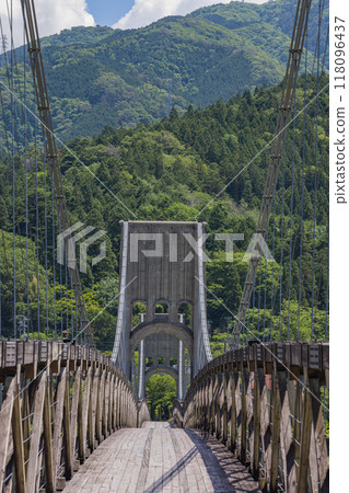 Momosuke Bridge, also known as Momo no Hashi, over the Kiso River in Minami Kiso Town, Kiso District, Nagano Prefecture, Japan 118096437