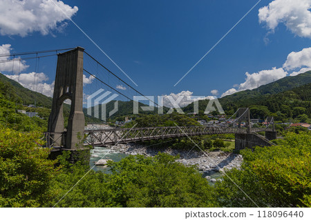 Momosuke Bridge, also known as Momo no Hashi, over the Kiso River in Minami Kiso Town, Kiso District, Nagano Prefecture, Japan 118096440