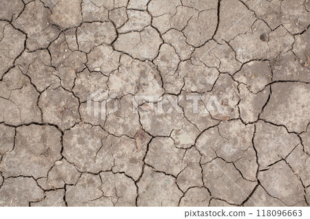 Cracked dry earth background, top view Cracked dry earth background, top view 118096663