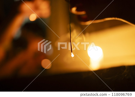 Children enjoying sparklers 118096769