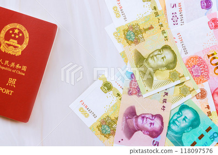 Passport People Republic of China with Chinese cash yuan money various denominations banknote Passport People Republic of China with Chinese cash yuan money various denominations banknote 118097576