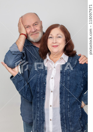 Portrait of an elderly couple in love in denim clothes. 118097971