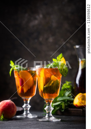 Cold ice tea with peach and mint 118098612