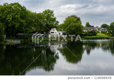 Aachen, Germany, July 26, 2024 - Natural reflections of the Diepenbenden water pond 118098939