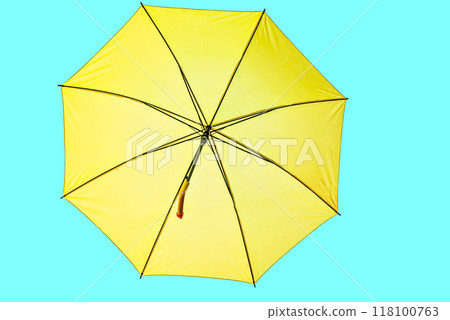 Open yellow umbrella on turquoise background Open yellow umbrella on turquoise background 118100763