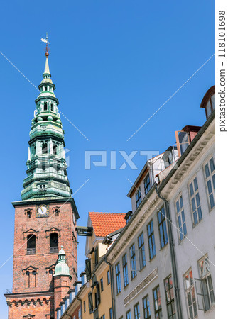 Downtown Copenhagen with old houses and church. Downtown Copenhagen with old houses and church. 118101698