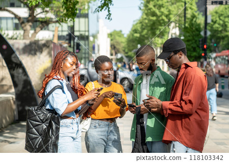 Black friends use smartphones not communicate not pay attention to each other, mired in social media Black friends use smartphones not communicate not pay attention to each other, mired in social media 118103342