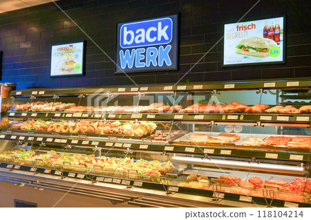 A bakery showcase filled with delicious looking breads A bakery showcase filled with delicious looking breads 118104214