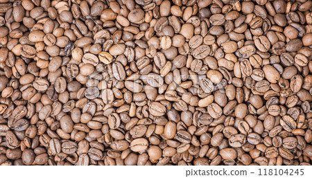 Roasted coffee beans as a background. Coffee, cheerfulness web size. Roasted coffee beans as a background. Coffee, cheerfulness web size. 118104245