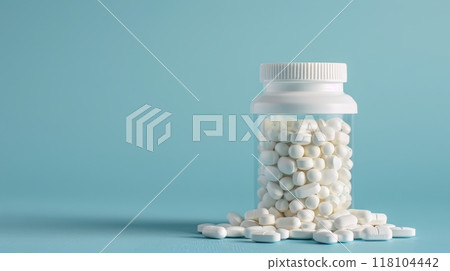 Medication bottle on blue background with ample space for text, top view for versatile use 118104442