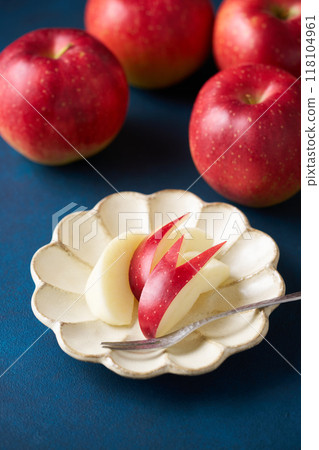 Cut apples on a plate Cut apples on a plate 118104961
