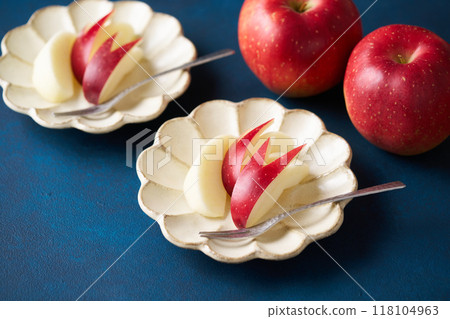 Cut apples on a plate Cut apples on a plate 118104963