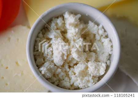 Indulge in our Fresh Homemade Cheese, featuring a delightful assortment of various cheeses Indulge in our Fresh Homemade Cheese, featuring a delightful assortment of various cheeses 118105241