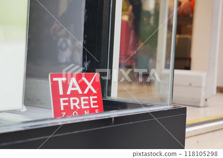 Prominent TaxFree Zone Sign Displayed in the Retail Store Window for Enhanced Visibility Prominent TaxFree Zone Sign Displayed in the Retail Store Window for Enhanced Visibility 118105298