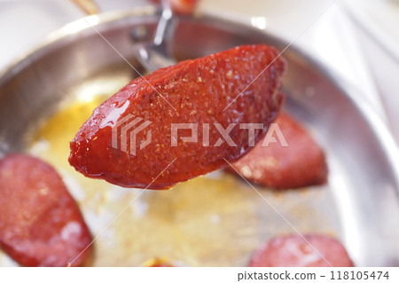 Turkish fried sausage sucuk in a pan 118105474