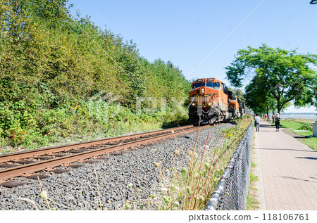 A train passing along the promenade at White Rock, Surrey, BC, Canada A train passing along the promenade at White Rock, Surrey, BC, Canada 118106761