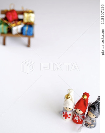 Christmas gnomes, bench and gift box on white background 118107136