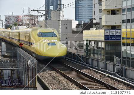 Doctor Yellow Shinkansen train travelling on the elevated section Doctor Yellow Shinkansen train travelling on the elevated section 118107771