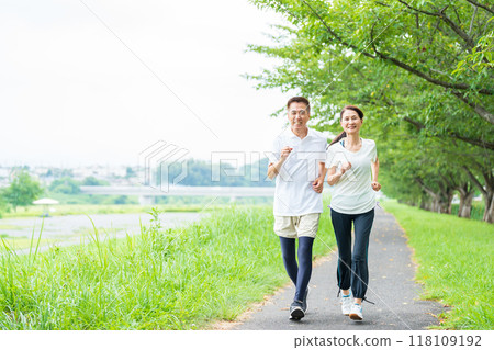 Senior couple doing jogging 118109192