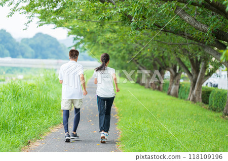 Back view of a senior couple jogging Back view of a senior couple jogging 118109196