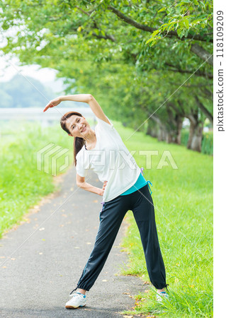 Senior woman stretching Senior woman stretching 118109209