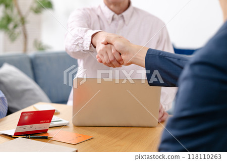 End of life life plan senior couple handshake 118110263
