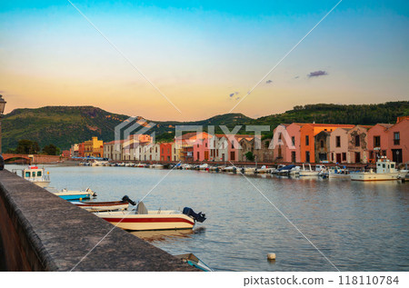 Sunset over Bosa with Temo River and boats in Sardinia, Italy 118110784