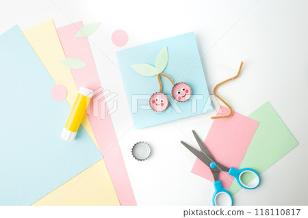 a pair of scissors sitting on top of a pile of paper, a pastel, card template, cherry, miniature product photo, circle, scrapbook a pair of scissors sitting on top of a pile of paper, a pastel, card template, cherry, miniature product photo, circle, scrapbook 118110817