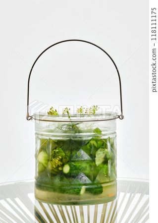 Jar with pickled cucumbers Jar with pickled cucumbers 118111175