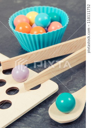 Colorful balls using for playing and development of kids motor skills Colorful balls using for playing and development of kids motor skills 118111752