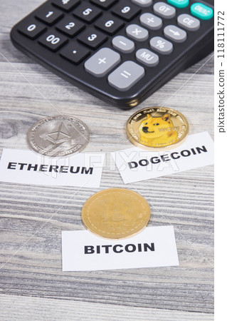 Cryptocurrency coins and calculator. International network payment. Finance concept Cryptocurrency coins and calculator. International network payment. Finance concept 118111772