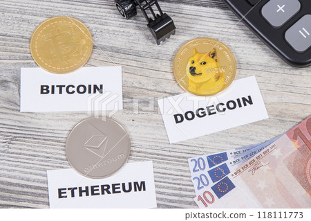 Cryptocurrency coins, euro, miniature excavator and calculator 118111773