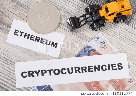 Ethereum, miniature excavator and euro. Cryptocurrency Ethereum, miniature excavator and euro. Cryptocurrency 118111774