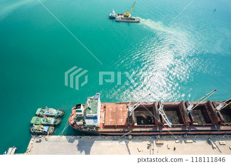 Aerial view of Harbor Cargo ship carrying container.Container ship Aerial view of business logistic import and export in the harbor Aerial view of Harbor Cargo ship carrying container.Container ship Aerial view of business logistic import and export in the harbor 118111846