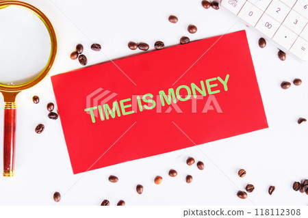 Time is Money Concept words written on a red crust, on a white background. View from above 118112308