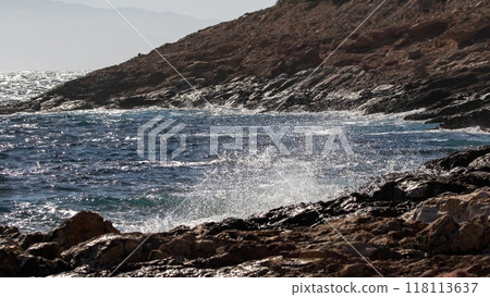 Rocky coast at the island of Donousa, Greece. Rocky coast at the island of Donousa, Greece. 118113637