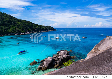 Beautiful seashore with wave crashing on sandy shore at Similan Islands Beautiful tropical sea Similan island No.8 at Similan national park, Phang nga Thailand Beautiful seashore with wave crashing on sandy shore at Similan Islands Beautiful tropical sea Similan island No.8 at Similan national park, Phang nga Thailand 118114740