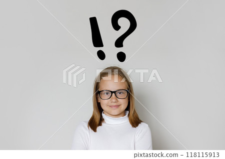 Happy young girl child school student with exclamation and question mark. Idea and Education concept 118115913