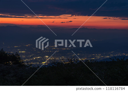The orange sunset sky seen from the Takabocchi Plateau on Mt. Takabocchi, located on the border between Okaya City and Shiojiri City, Nagano Prefecture, Japan The orange sunset sky seen from the Takabocchi Plateau on Mt. Takabocchi, located on the border between Okaya City and Shiojiri City, Nagano Prefecture, Japan 118116784