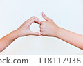 Child making a heart shape 118117938