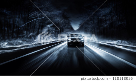 a car rushes at night along the highway outside the city, it is dark, starry sky and haze, blurred traffic 118118036