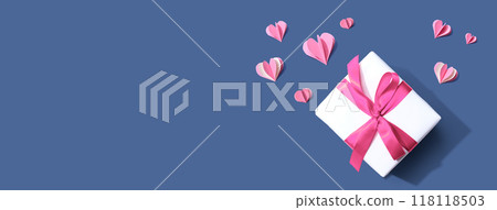 Gift box with pink paper hearts 118118503