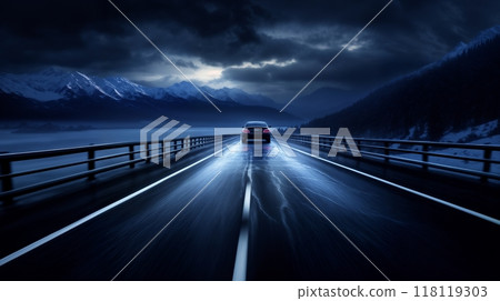 a car rushes at night along the highway outside the city, it is dark, starry sky and haze, blurred traffic 118119303