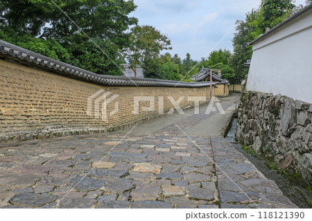 Nara's Nigatsudo Hall: A quiet back approach surrounded by earthen walls 118121390